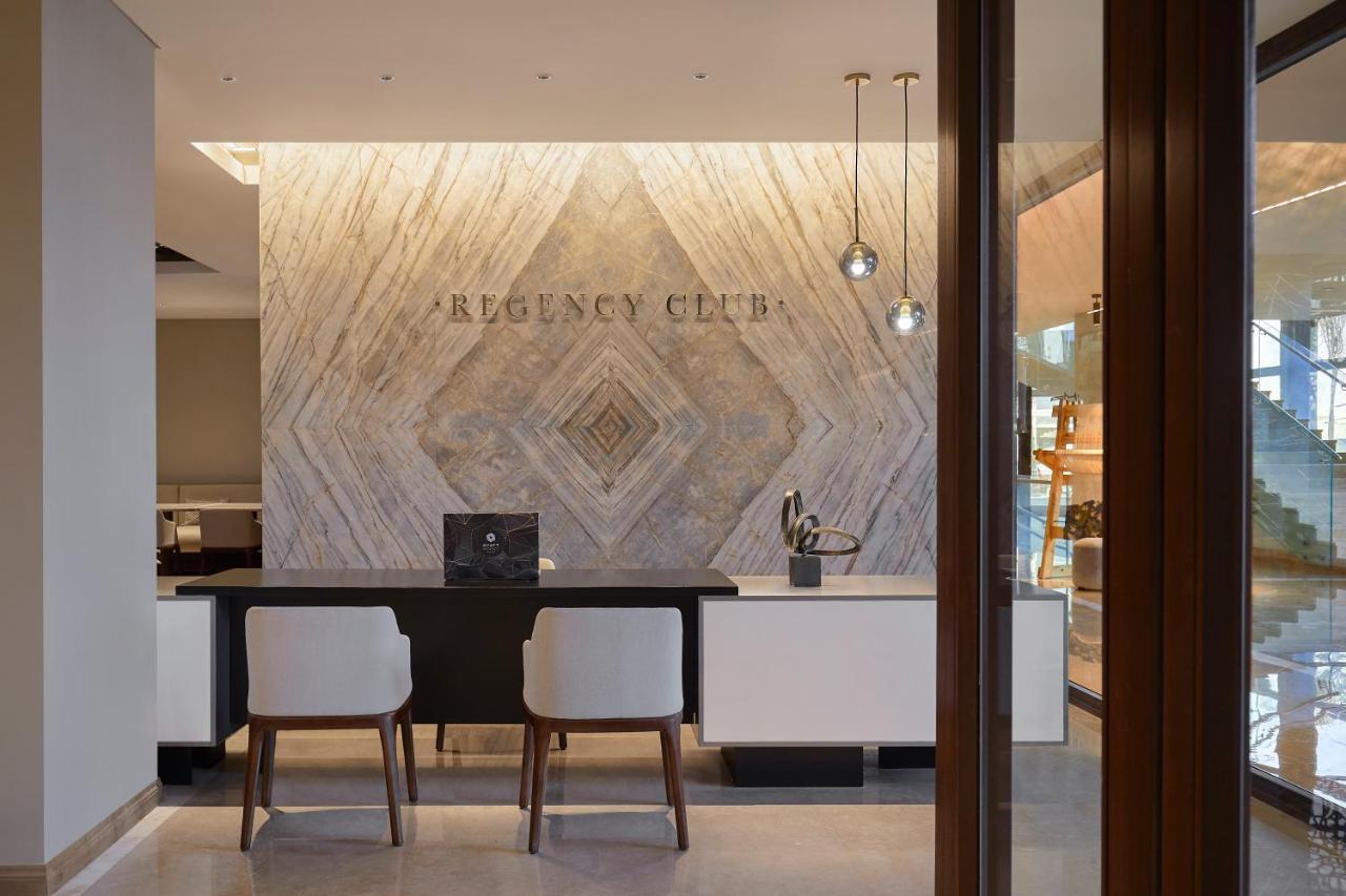 Отель Hyatt Regency Cairo West 6th of October City Экстерьер фото Reception desk at the Regent Center