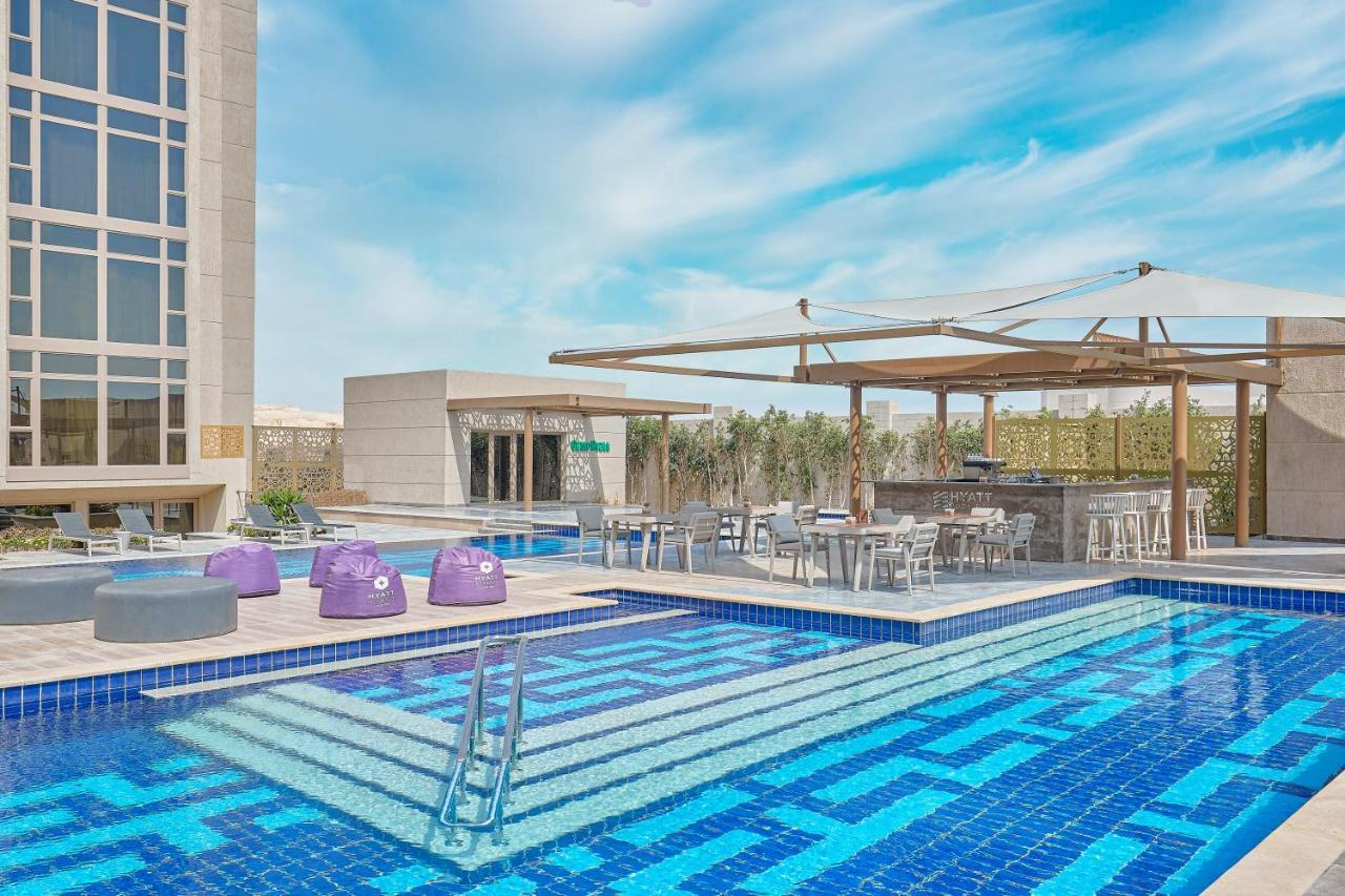 Отель Hyatt Regency Cairo West 6th of October City Экстерьер фото Rooftop pool at the hotel