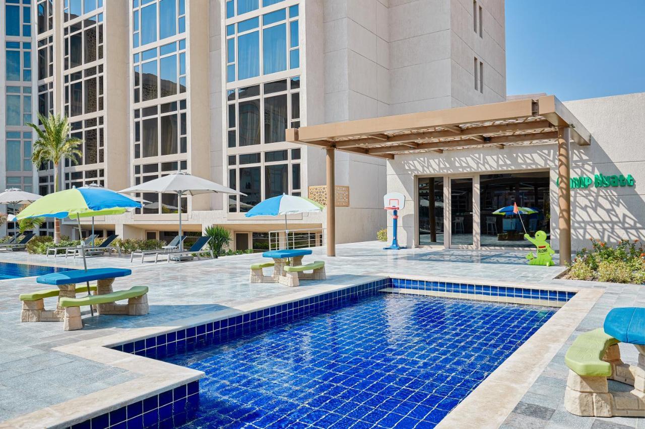 Отель Hyatt Regency Cairo West 6th of October City Экстерьер фото The pool at the hotel